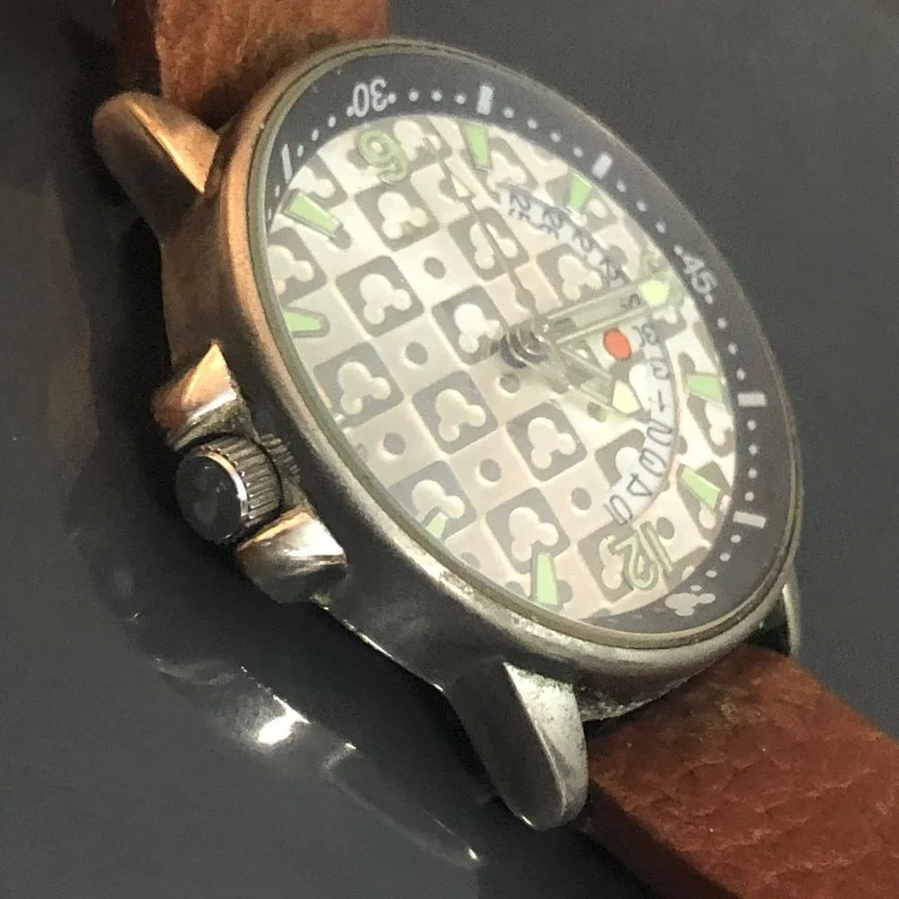 Disney Time Works Swing Glowing Date Watch
